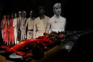 Scrimitore Paolo - Nuvolari - Il brano di Lucio Dalla  è contenuto nell'album Automobili (1976) - Al  museo dell'auto (Torino) al  primo posto tra i cartonati presenti è Nuvolari avanti a Varzi: Il testo del brano recita "... Ma Nuvolari rinasce come rinasce il ramarro batte Varzi, Campari, ..."  La foto è la fusione di 2 scatti che uniscono il mito presente e passato anche col passaggio dal B&N al colore.